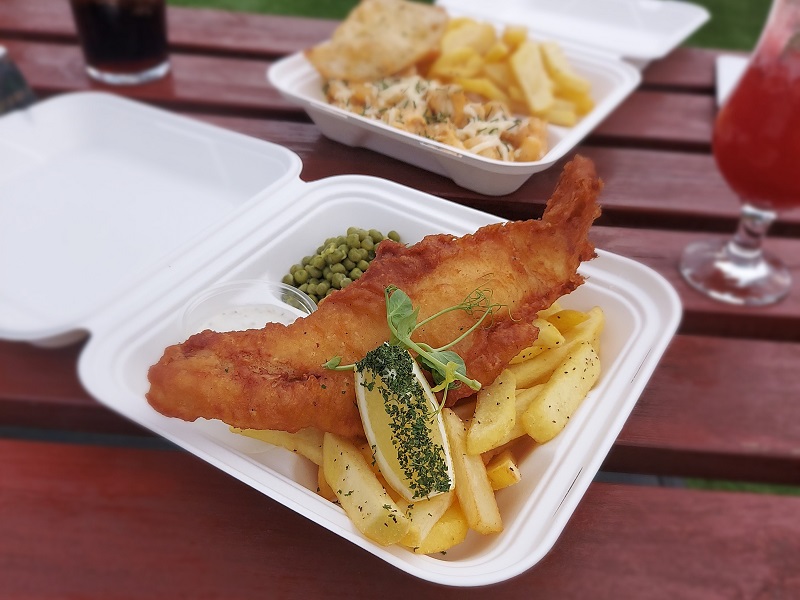 Fish and chips, served in a takeaway tray, at the Davron hotel