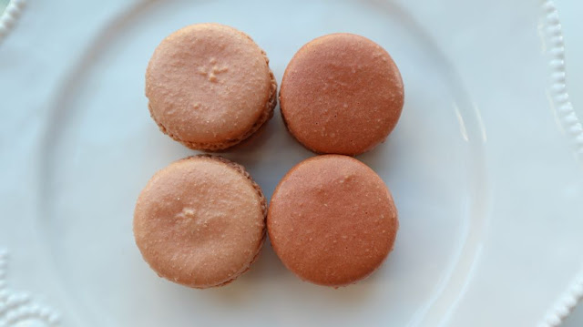 comparing the difference between the two batches of macarons.