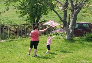Rosie and Mummy flying a kite
