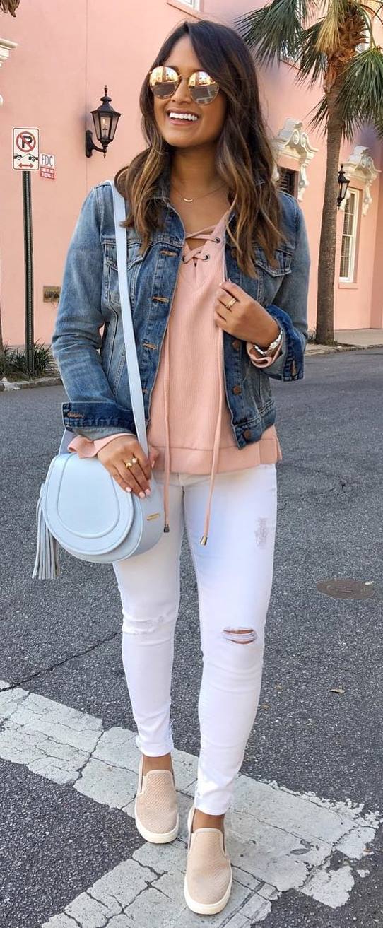 casual style perfection: denim jacket + sweatshirt + bag + rips + sneakers