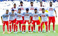 SEVILLA F. C. - Sevilla, España - Temporada 2015-16 -  Kolodziejczak, Fazio, Llorente, Sergio Rico e Iborra; Diogo, Cristóforo, Cotan, Sánchez, Coke y Matos - R. C.D. ESPANYOL DE BARCELONA 1 (Caicedo) SEVILLA F. C. 0 - 01/05/2016 - Liga de 1ª División, jornada 36 - Barcelona, estadio Cornellá-El Prat - Los jugadores del Sevilla portan camisetas de apoyo a Michael Krohn-Dehli, que sufrió una espeluznante lesión en el partido anterior de la Europa League