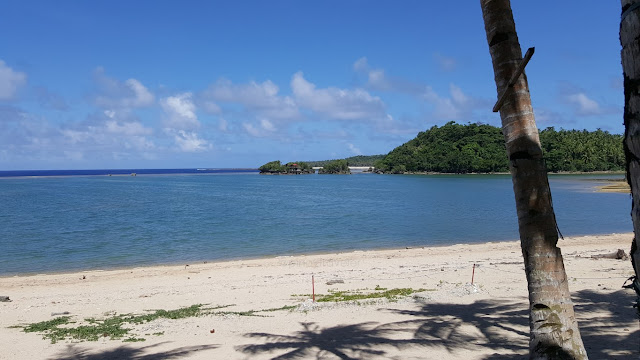 view of the white sand beach to the right of Bacayaw Resorts Cove in Llorente Eastern Samar, which is about 300 meters from the highway (9HFW+9QV)