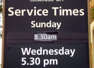 Normal church sign with worship times