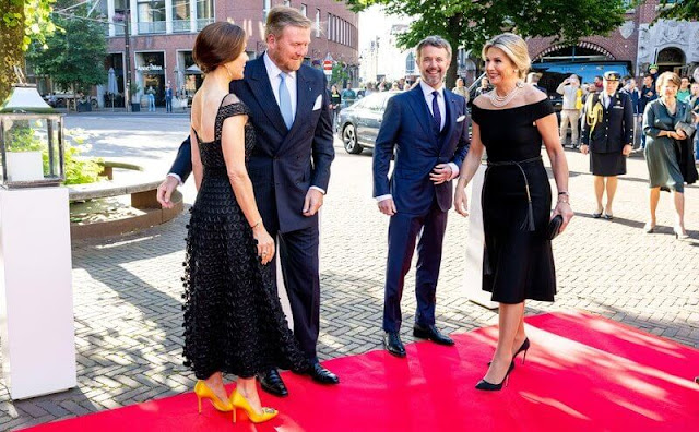 Crown Princess Mary wore a Temperley London gown. Queen Maxima wore a Carolina Herrera dress
