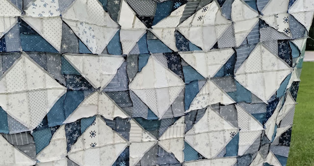 Razzleberry quilt in blue and white fabrics