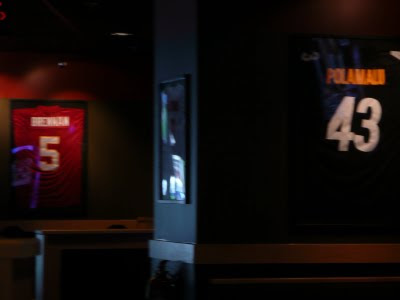 Buffalo Wild Wings in Hawaii displaying Hawaiian football players