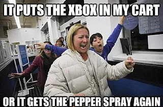 It puts the xbox in my cart or it gets the pepper spray again. Hilarious Black Friday Meme