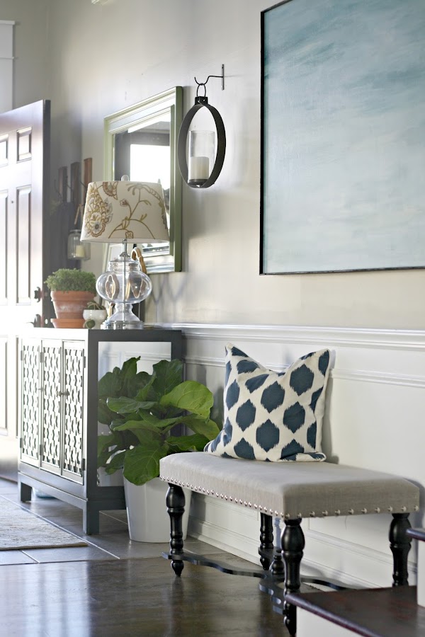 Bench and console table in foyer