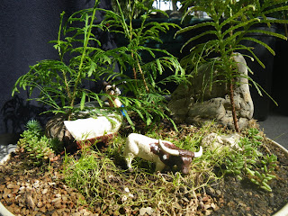 Hunting scene from  Snow White Story in miniature garden