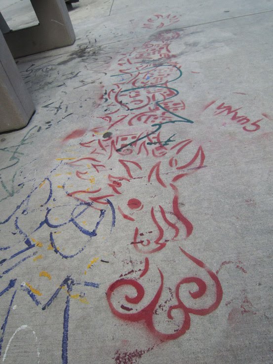 Street Art Dragon Stencil Cool sidewalke stenciled dragon