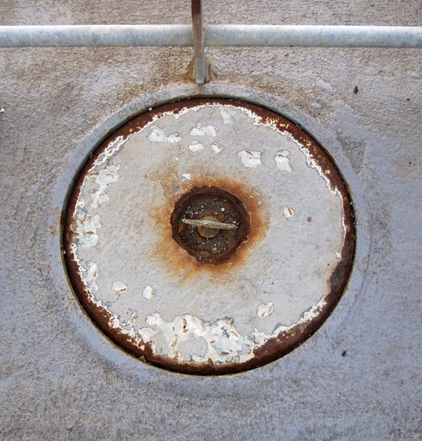 Rusty hatch and railing