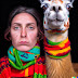 Woman and llama who both look identical…