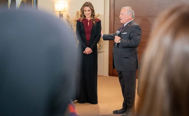 King Abdullah and Queen Rania with a group of women on occasion of International Women’s Day