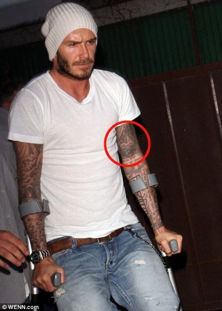 Seberapa banyak tattoo yang ada di lengan dan dada david beckam sangat 