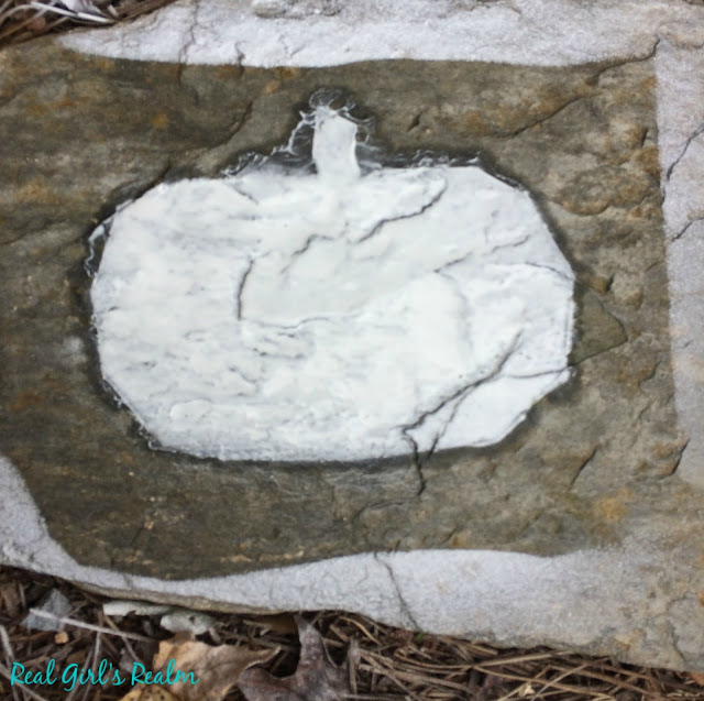 Make spooky stepping stones with chalk spray