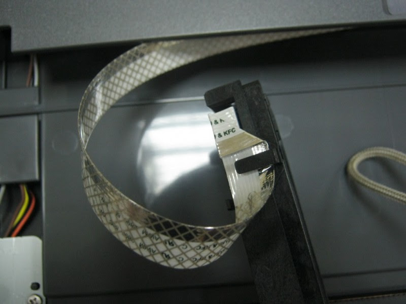 الضوء لصيانة أجهزة الأستنساخ: تصليح العطل E-301-0001 في طابعة كانون Canon 4410