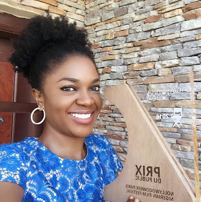 Omoni Oboli shows off her award at the Nollywood Week Festival in Paris (Photo)