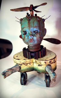 Andy skinner altered doll flying machine