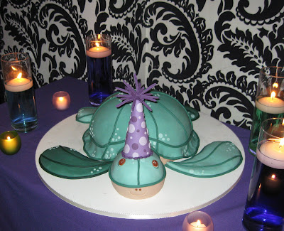This topsyturvy cake was done for a rockin' Sweet Sixteen party last year