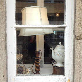window with table lamp and teapot