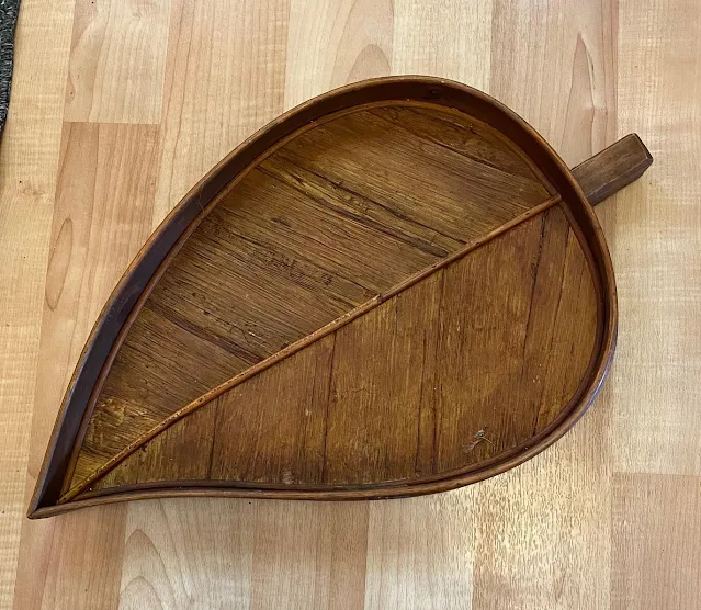 Photo of a leaf shaped tray from Goodwill.