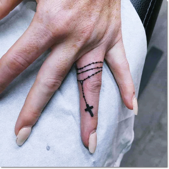 cross tattoo on finger, cross tattoos for women