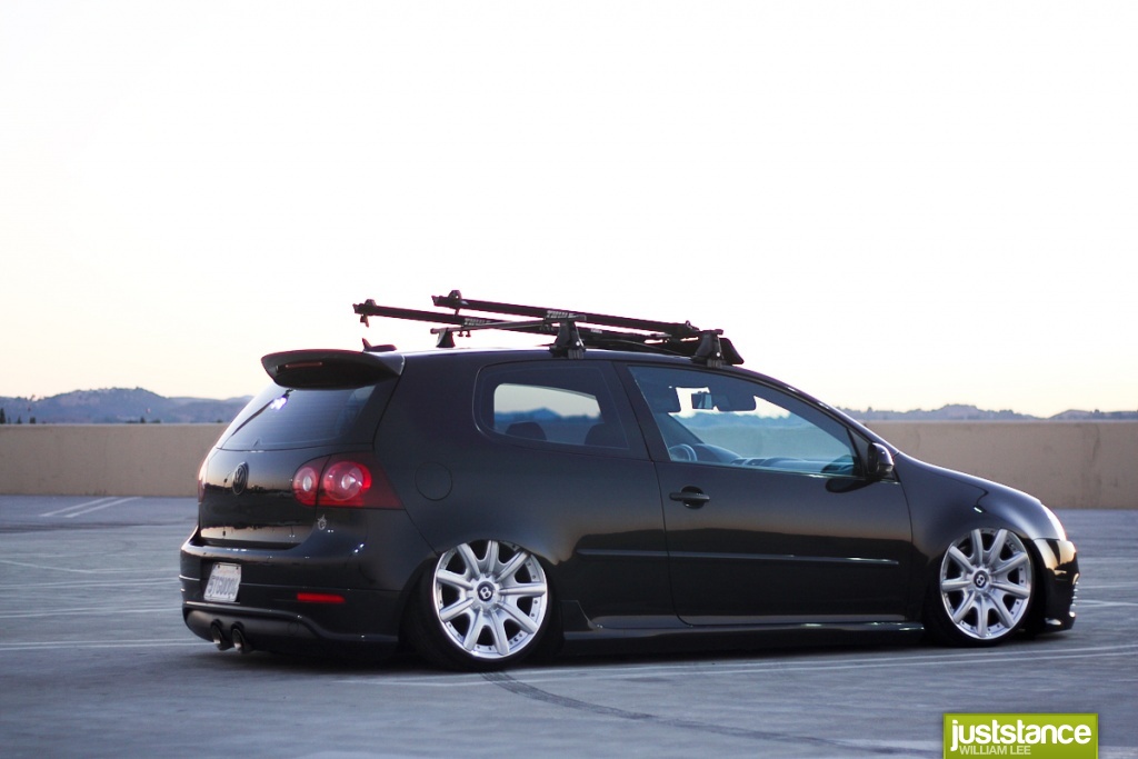 He we find a mkV Golf sitting very very low over 19 Bentley wheels
