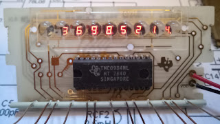 TI-33 only circuit board with bubble LED display and TMC0984L IC. The manufacturer's logo is etched in the copper in plain sight!