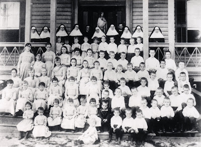 The Orphans and Nuns of St Mary's Orphan's Asylum, Galveston, Texas; photo from Rosenberg Library, Galveston