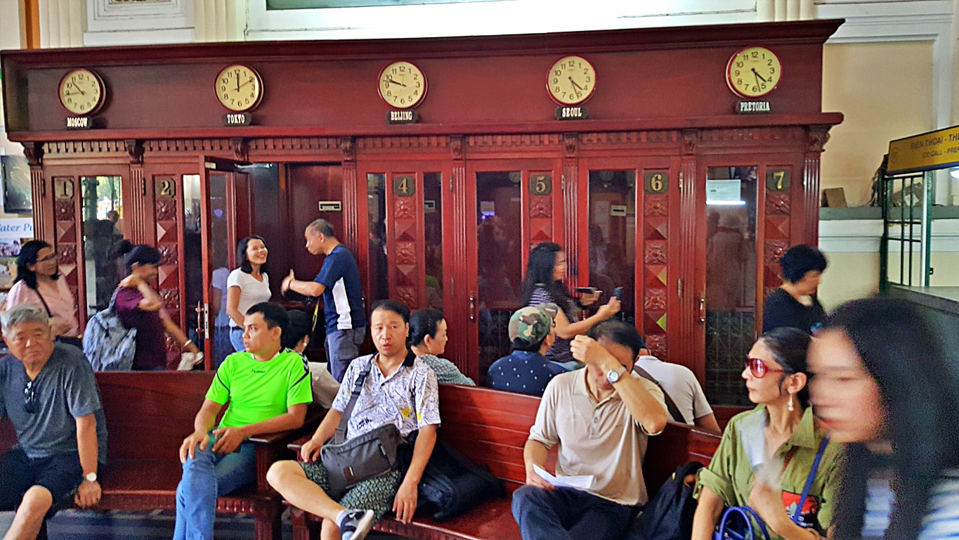 the remaining phone booths inside the Saigon Central Post Office Building