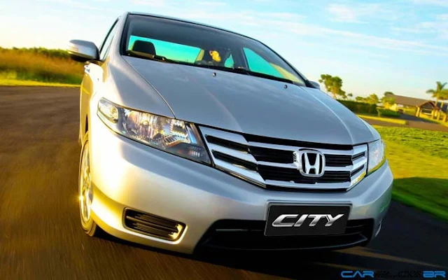 Honda City 2013 ou Sonic Sedan