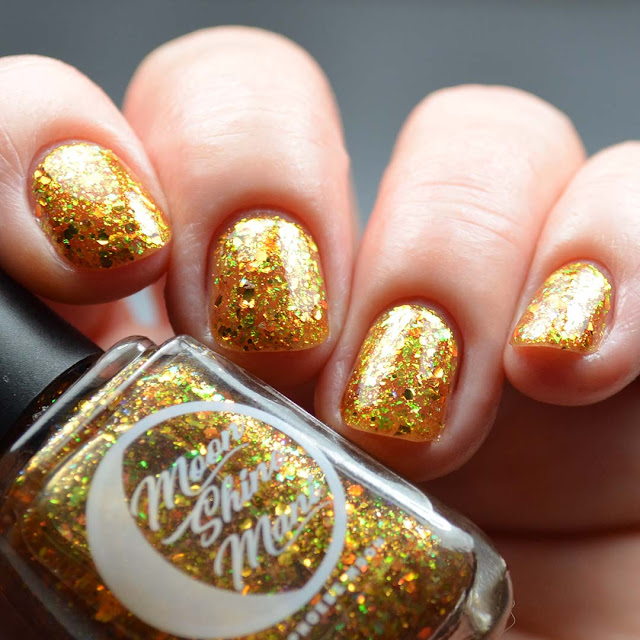 gold glitter nail polish swatch