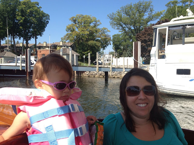 brooke and baby bear on a boat