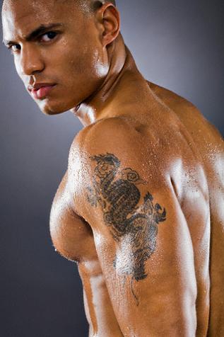 Girls rarely sport dragon tattoos, but they are quite popular among men.