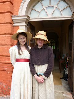 Costumed guides at the front entrance to Kew Palace