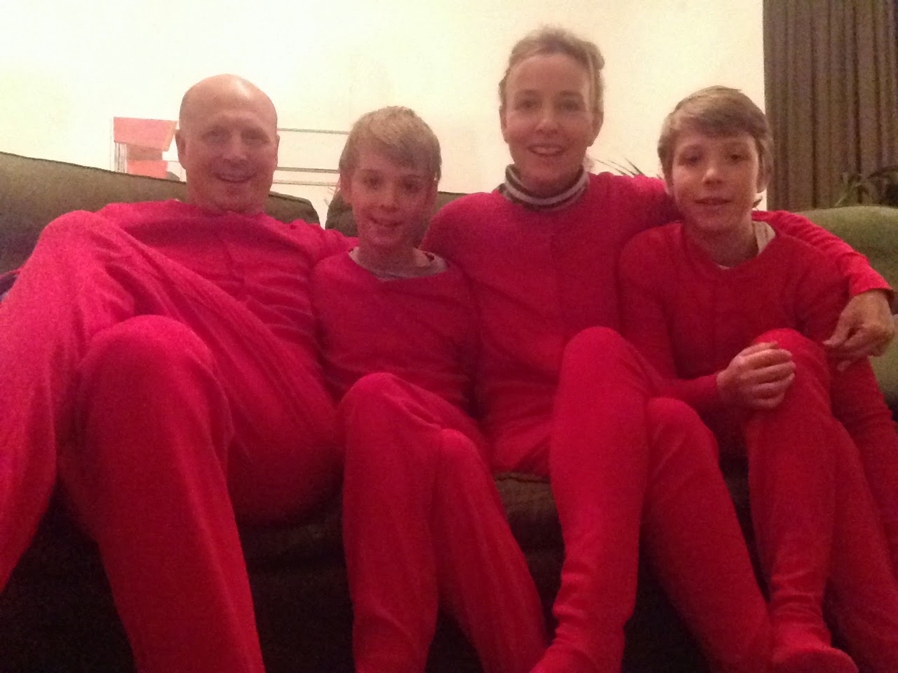 Family photo in red onesies