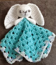 http://www.ravelry.com/patterns/library/cute-bunny-comforter---lovey