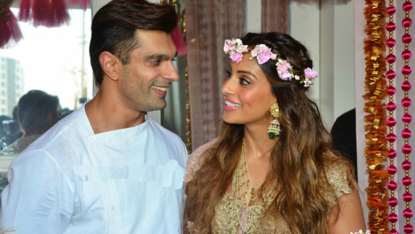 Bipasha Looked Lovely in Baby Pink Floral Lehenga  at Their Mehendi Ceremony