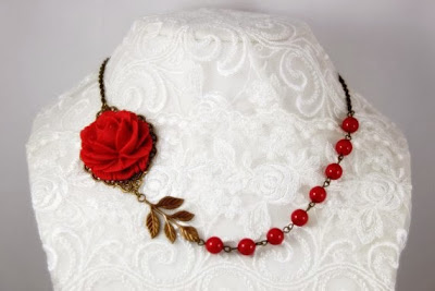 https://www.etsy.com/listing/105540488/crimson-red-rose-with-red-swarovski?ref=favs_view_1