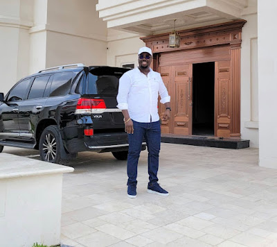 Obi Cubana with his car