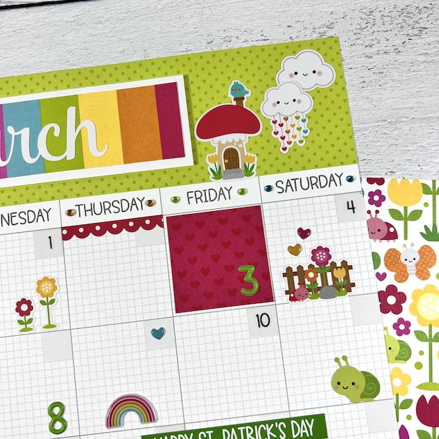 12x12 March Calendar Scrapbook Page with rainbow, mushroom house, and clouds