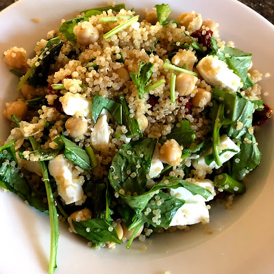 quinoa salad with arugula, feta, chickpeas, tomatoes