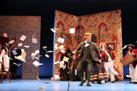 IN PERFORMANCE: Bass-baritone TYLER SIMPSON as Dottor Bartolo (center) in North Carolina Opera's production of Gioachino Rossini's IL BARBIERE DI SIVIGLIA, 1 April 2016 [Photo by Curtis Brown, © by North Carolina Opera]