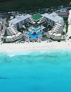 . we booked flights and hotel accommodations for Cancun, Mexico.