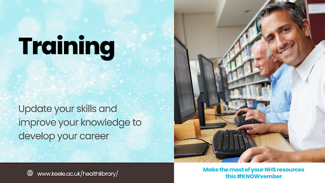 nhs staff working on computers in the library