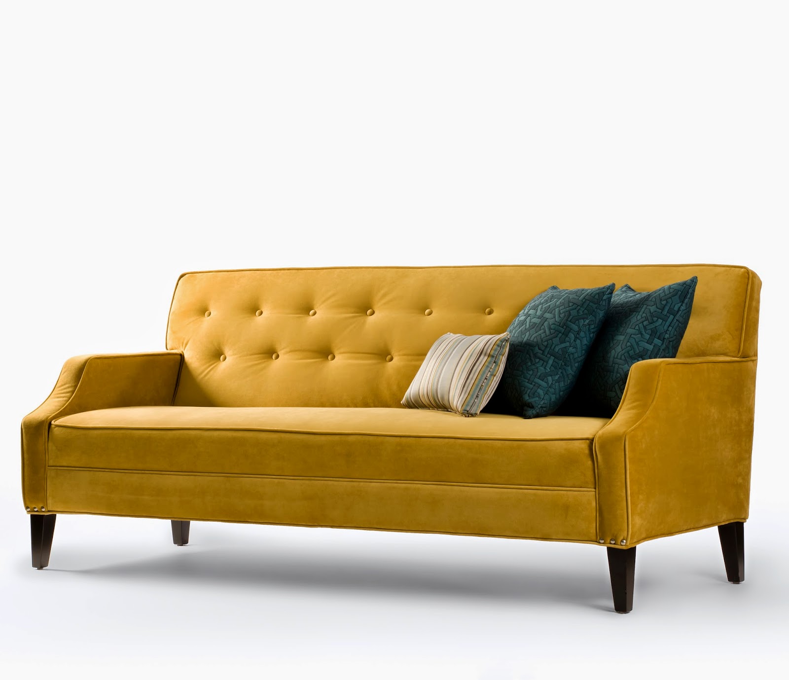 mustard button tufted tacked couch