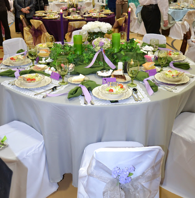This is the same table showing the table with the purple ribbon and flowers