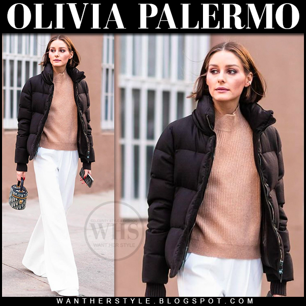 Olivia Palermo in black puffer jacket and white wide leg pants