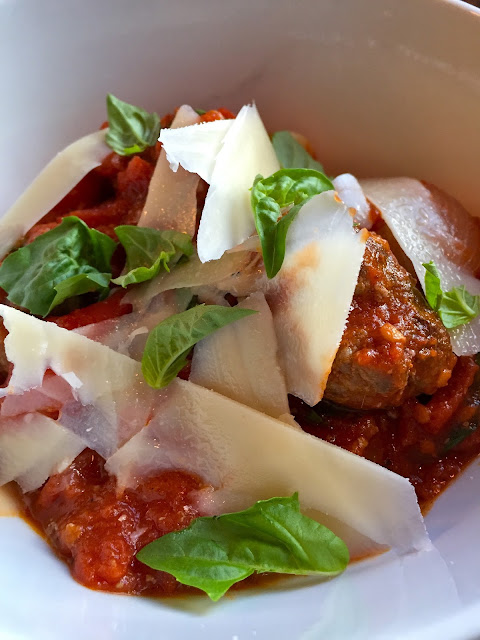 San Marzano tomato sauce with meatballs, parmesan and basil