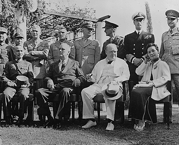 Kai-shek, Roosevelt, Churchill, and Madame Chiang seated at the Cairo Conference in November 1943